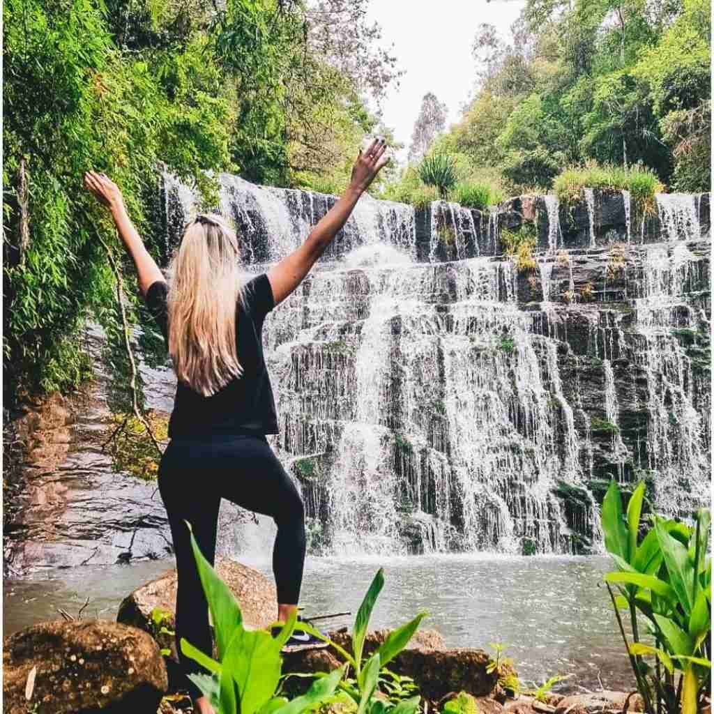 Dani in front of water fall