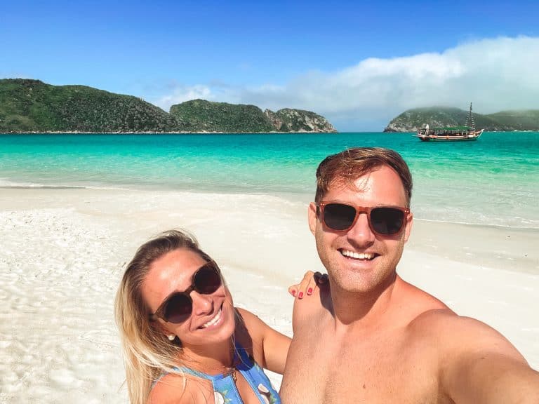 Dani and Wade standing at a beach