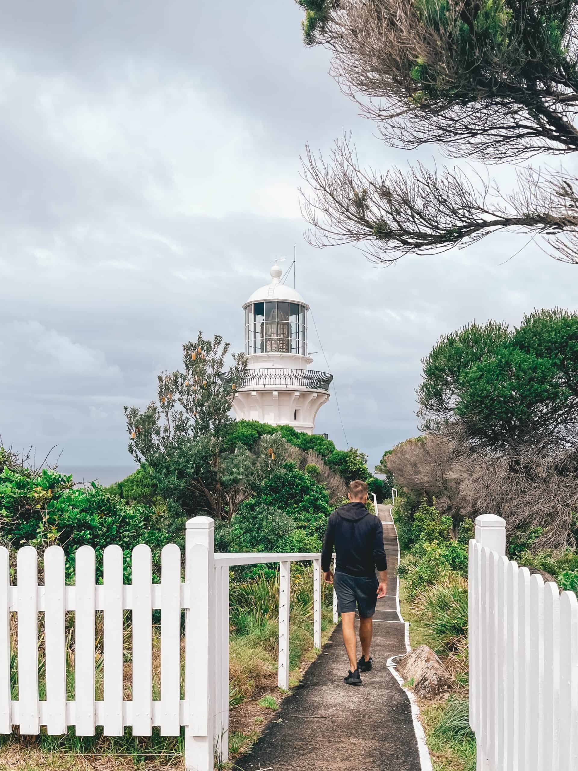 Wade walking towards lighthouse