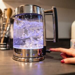 Glass Kettle with water and turned on
