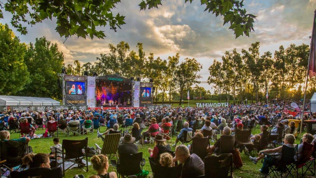 Lots of people watching a band at the Tamworth Country Music Festival