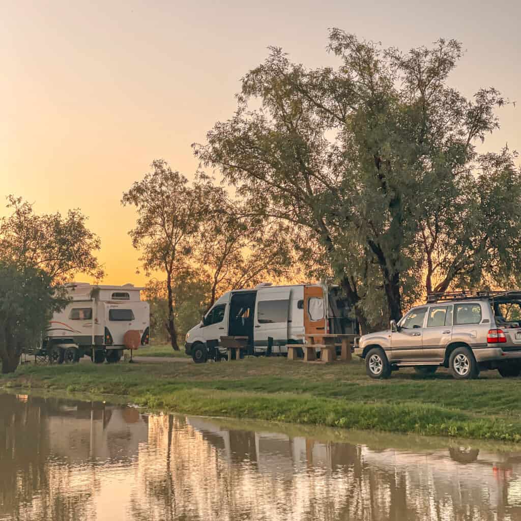 Our van Camping by the river with other people