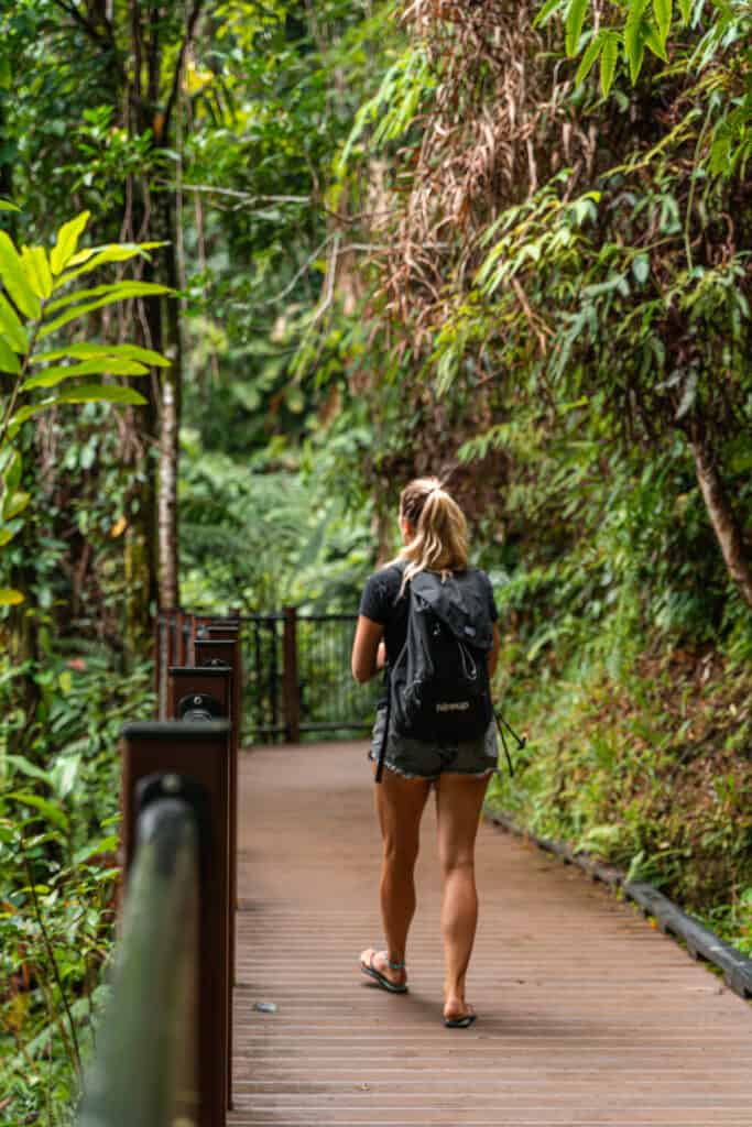 Dani walking across a bridge at Babinda Boulders