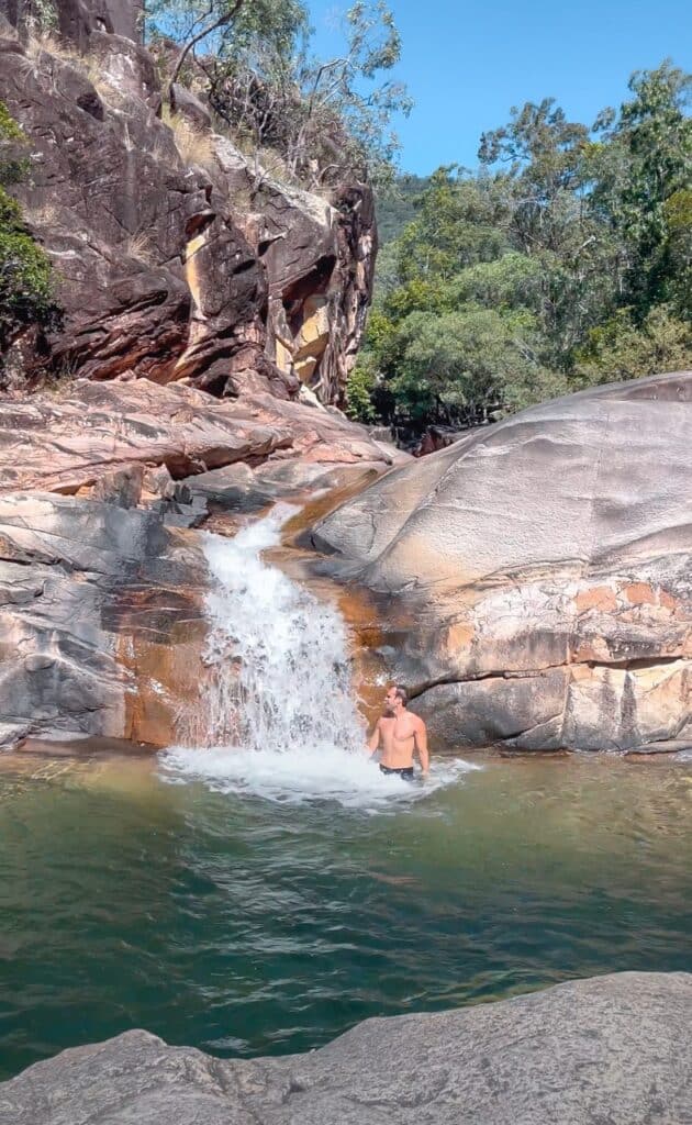 Wade under the waterfall at Big Crystal Creek