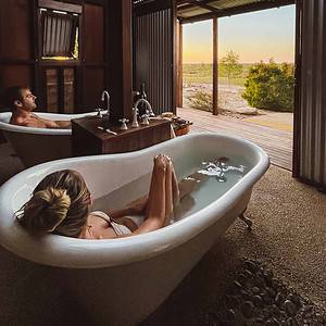 Dani and Wade in the Julia creek bath tubs