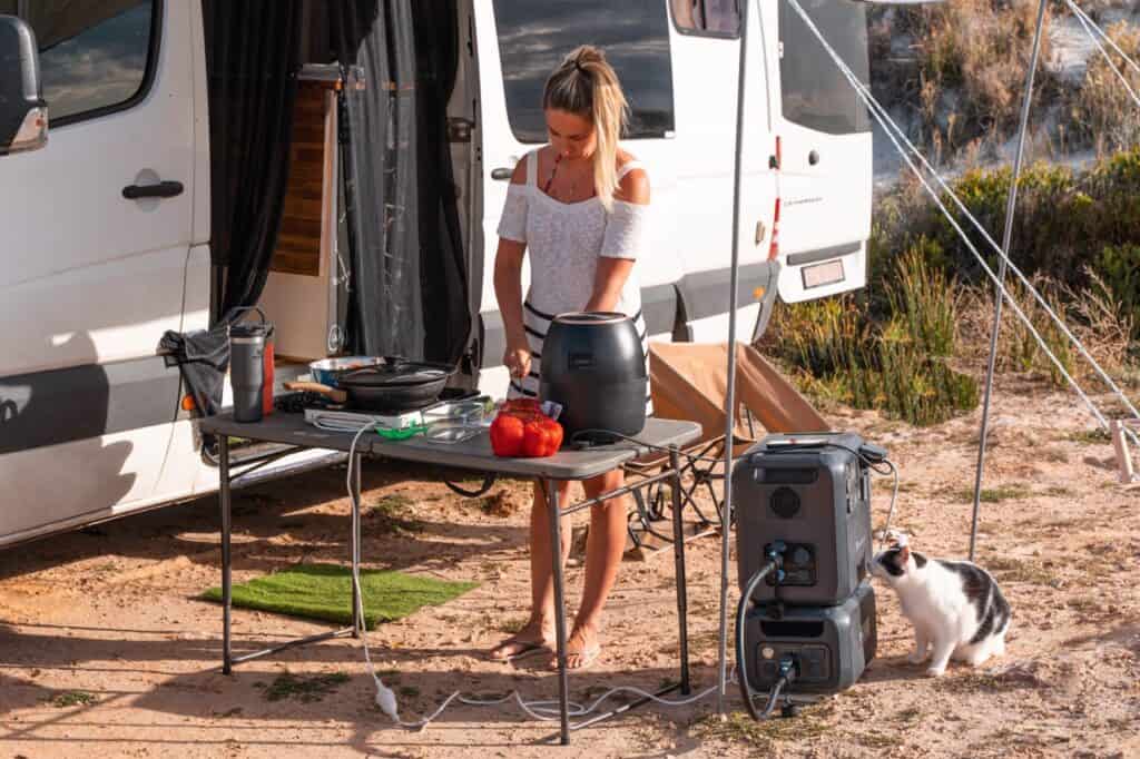 Cooking outside a camper van with the BLUETTI AC200MAX and B230 Combo 