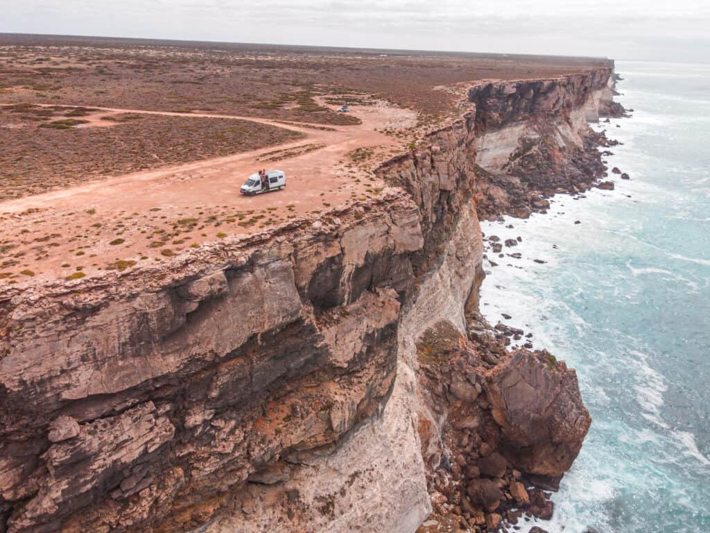 Our campervan parked at Bunda Cliffs. The van is very close to the amazing cliffs by the ocean. 