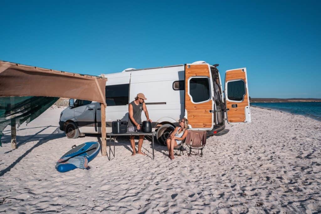 Bluetti AC180 at the beach with a van