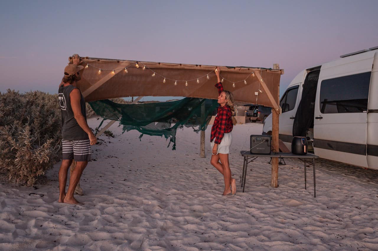 Off grid camping on a beach with a our camper van