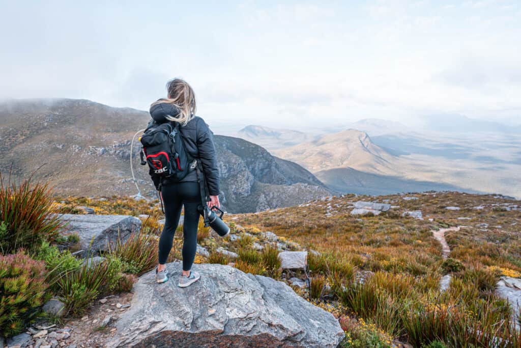 Dani standing on a rock half way up Bluff Knoll