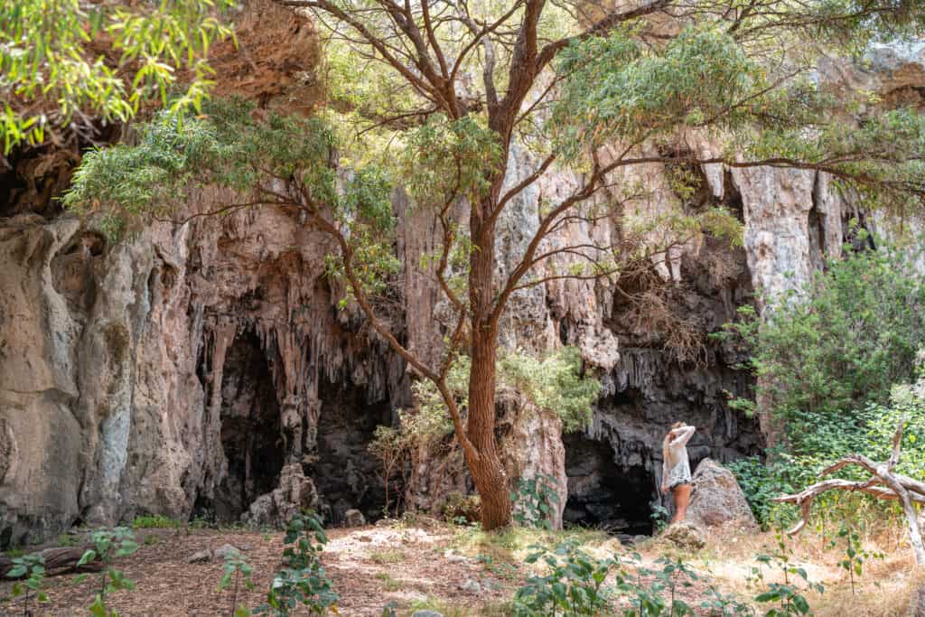 Dani standing under a free cave we found in Margaret River