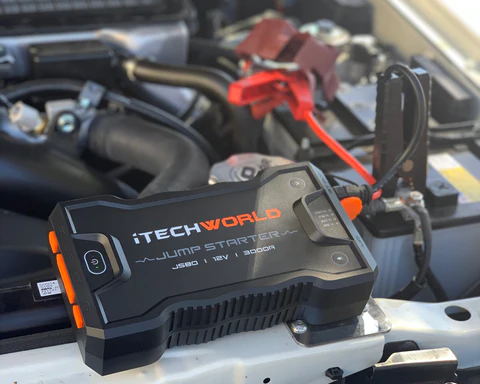 iTechwork JS80 Portable jump starter connected to battery