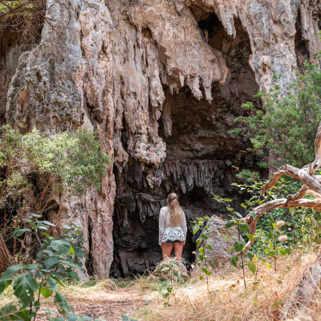 Dani looking up at the free cave in Margaret River