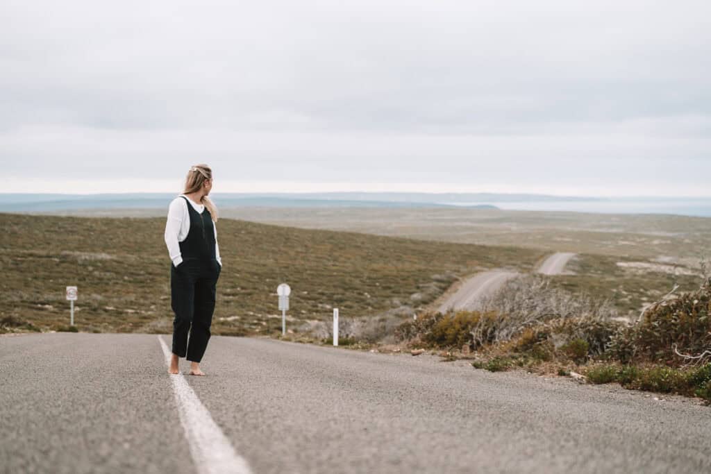 Dani standing in the middle of the road at Flinders Chase